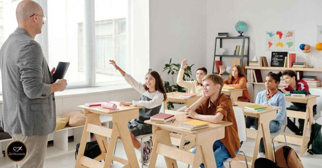 Kindergarten students receiving graduation certificates in classroom